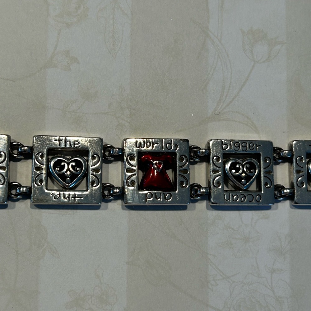 Brighton charm bracelet, red dress, the only thing bigger than your heart….
